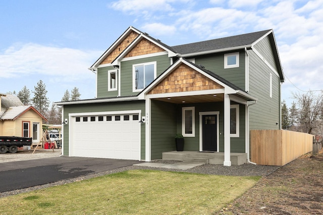 craftsman house with a garage