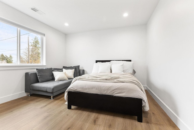 bedroom featuring light hardwood / wood-style flooring