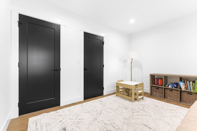 bedroom featuring hardwood / wood-style floors