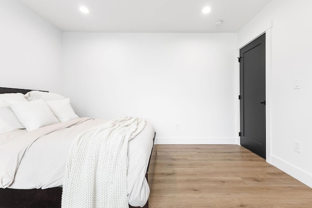 bedroom featuring light hardwood / wood-style flooring