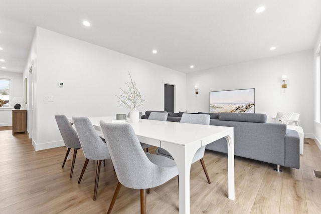 dining space featuring light hardwood / wood-style flooring