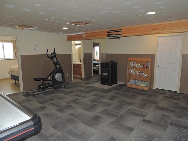 exercise area with dark colored carpet