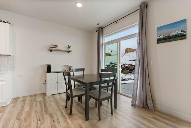 dining area featuring light hardwood / wood-style flooring