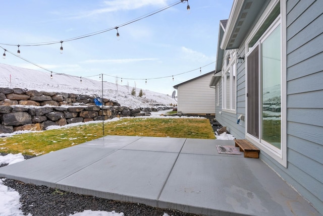 view of snow covered patio