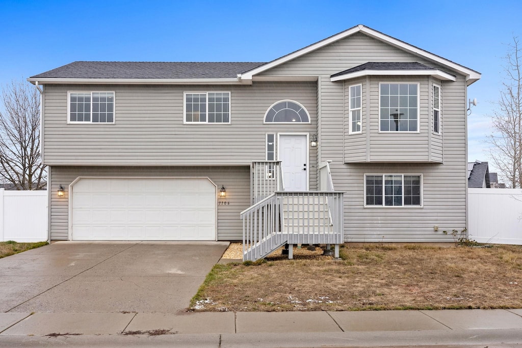 raised ranch with a garage