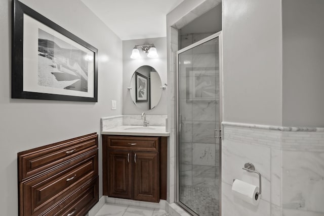 bathroom with vanity and an enclosed shower