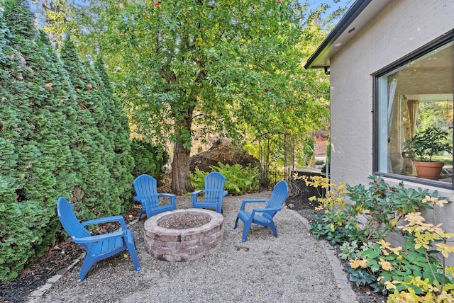 view of patio featuring an outdoor fire pit