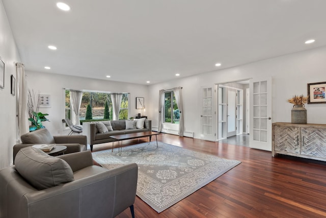 living room featuring dark hardwood / wood-style floors and french doors