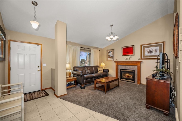 living room with light tile patterned floors, vaulted ceiling, and an inviting chandelier