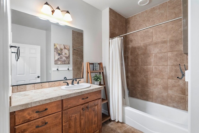 bathroom featuring tile patterned flooring, vanity, and shower / bath combo with shower curtain