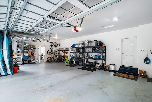 garage featuring a garage door opener