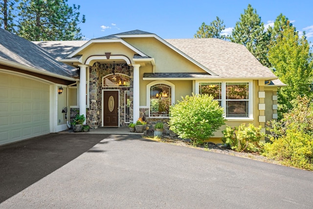 view of exterior entry featuring a garage