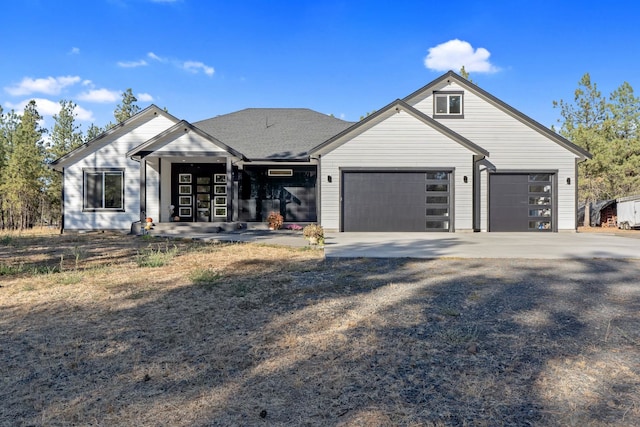 view of front of property with a garage