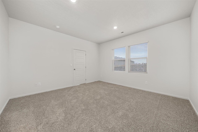 empty room featuring carpet