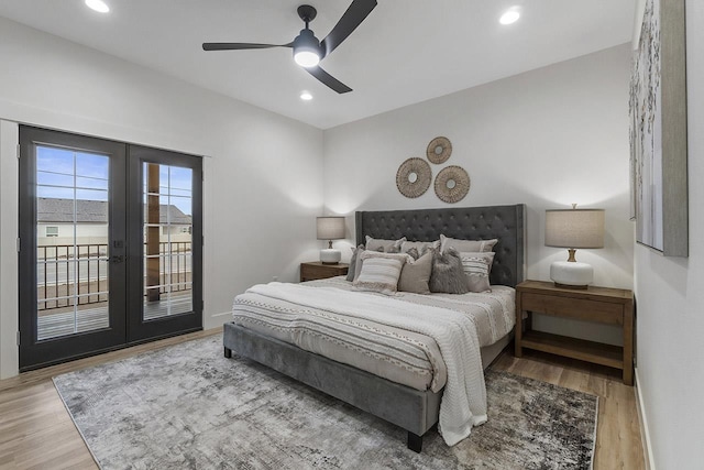 bedroom with access to exterior, french doors, light hardwood / wood-style floors, and ceiling fan