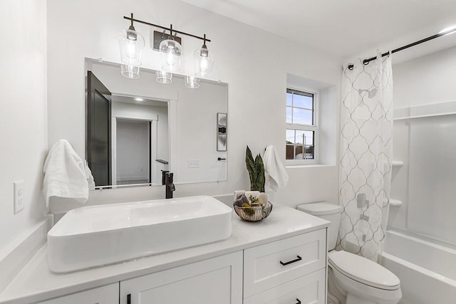 full bathroom featuring vanity, toilet, and shower / tub combo with curtain