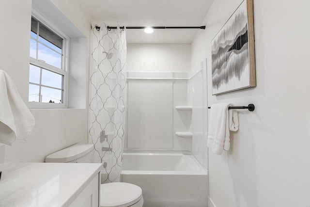 full bathroom with vanity, toilet, and shower / bath combo with shower curtain