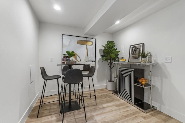 dining room with light hardwood / wood-style flooring