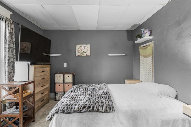 bedroom featuring a paneled ceiling