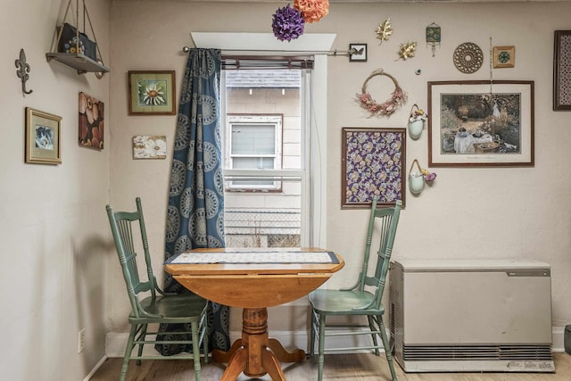 dining room with hardwood / wood-style floors