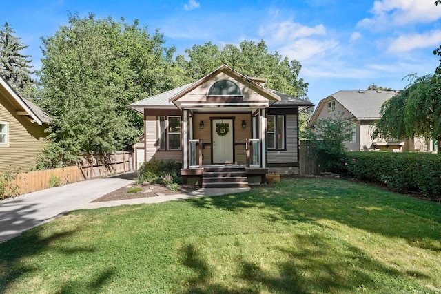 bungalow with a front yard