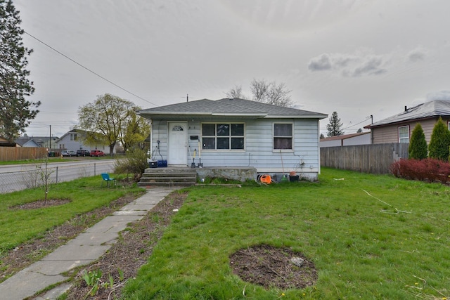 view of front facade with a front lawn