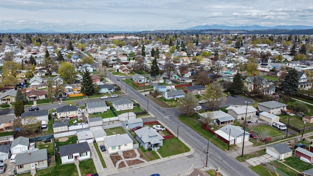 drone / aerial view featuring a mountain view