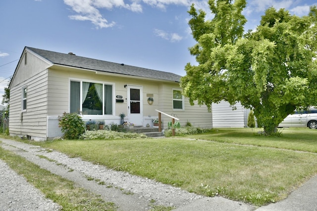 view of front of property with a front yard