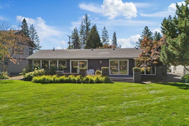 ranch-style house with a front yard