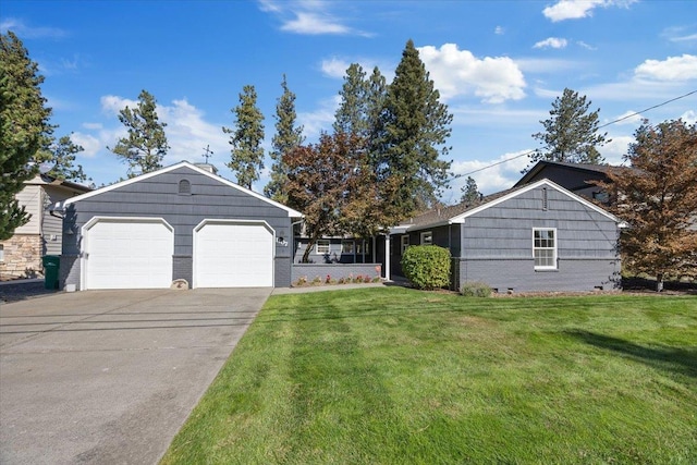 single story home with a front yard and a garage