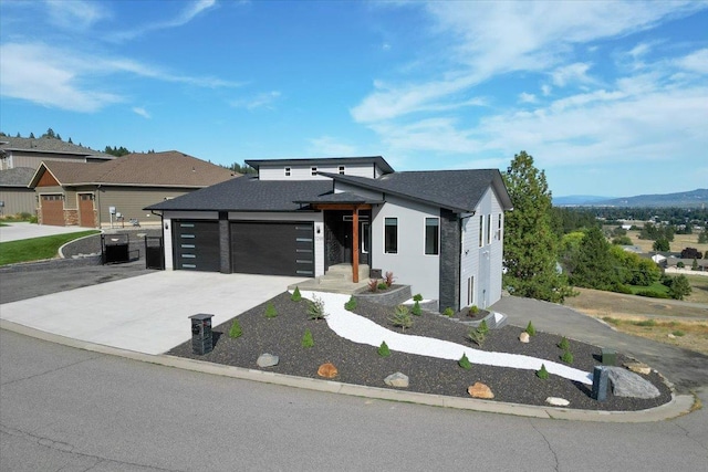 view of front of home with a garage