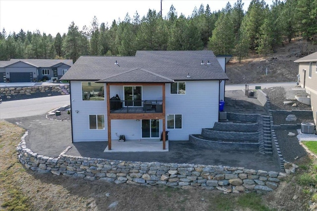 back of property featuring a patio area