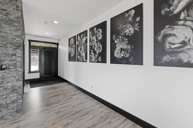 entrance foyer featuring hardwood / wood-style flooring