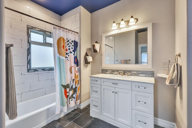 bathroom with vanity, shower / bath combo, backsplash, and tile patterned floors