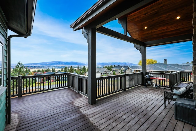 wooden terrace with a mountain view