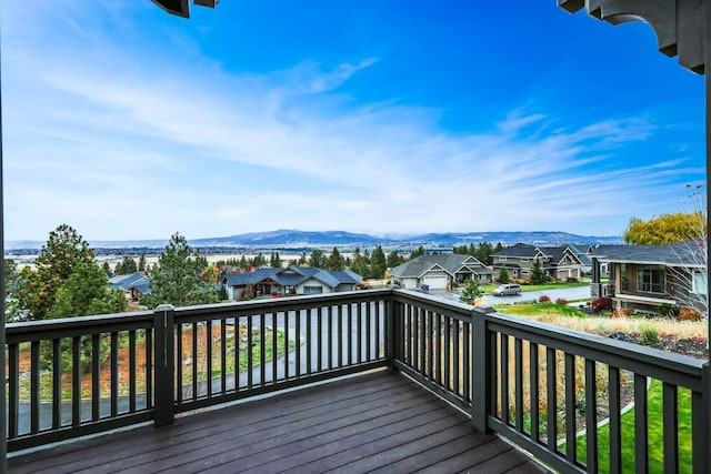 wooden terrace featuring a mountain view