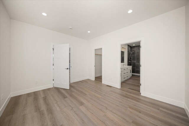 4217 W Tolliver Ct, Spokane, WA 99208 - unfurnished room with light wood finished floors and recessed lighting
