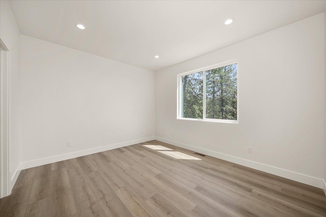 4217 W Tolliver Ct, Spokane, WA 99208 - spare room with light wood-style flooring and recessed lighting