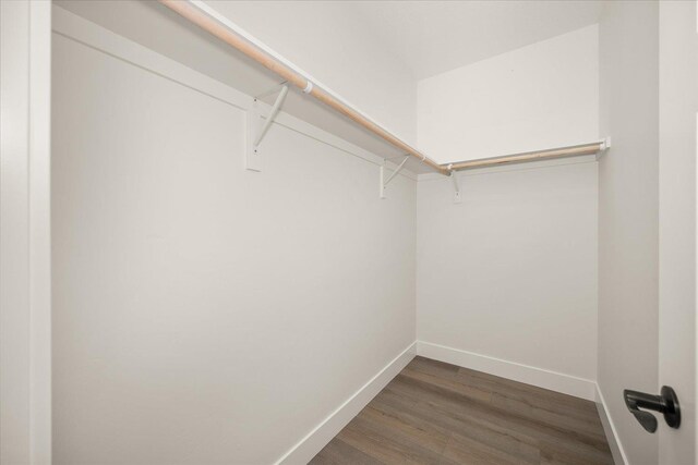 4217 W Tolliver Ct, Spokane, WA 99208 - walk in closet featuring wood finished floors