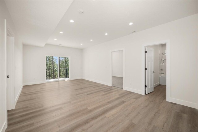 4217 W Tolliver Ct, Spokane, WA 99208 - empty room featuring light wood-style flooring, recessed lighting, and a smoke detector