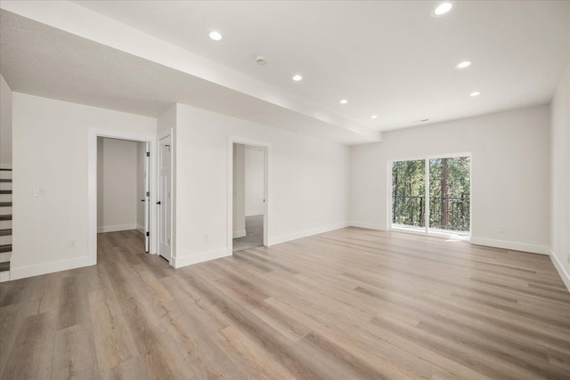 4217 W Tolliver Ct, Spokane, WA 99208 - unfurnished living room featuring recessed lighting and light wood-type flooring