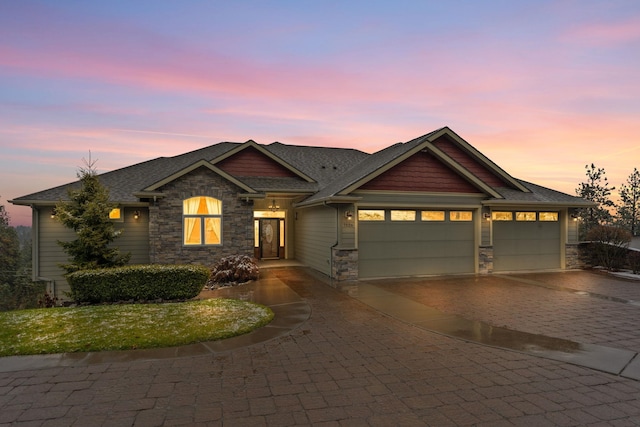 craftsman inspired home with a garage