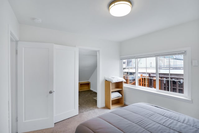 bedroom with light carpet