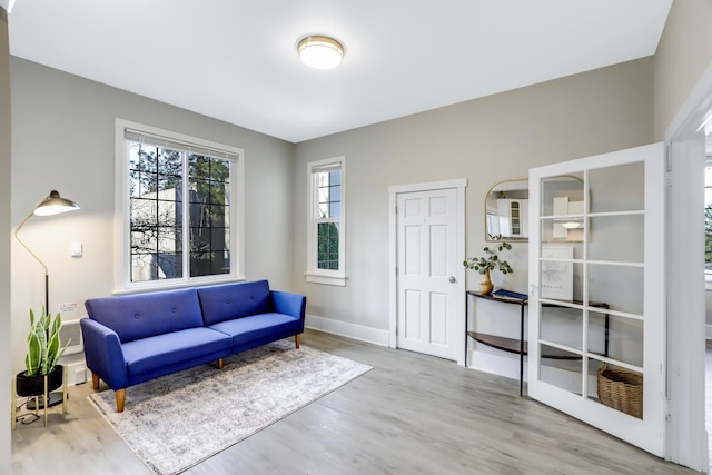 sitting room featuring light wood-type flooring