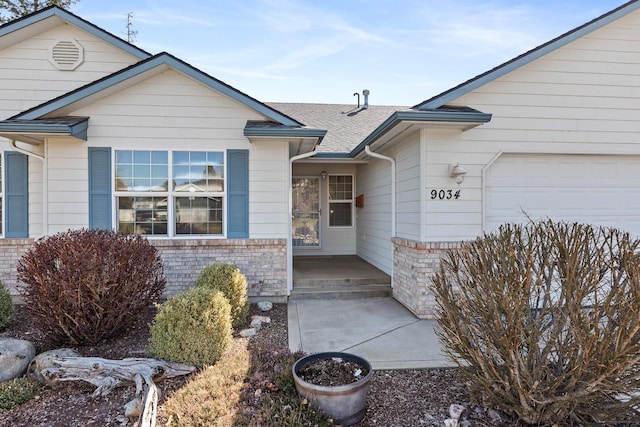 property entrance featuring a garage