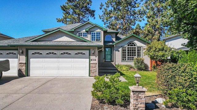 view of front of home with a garage