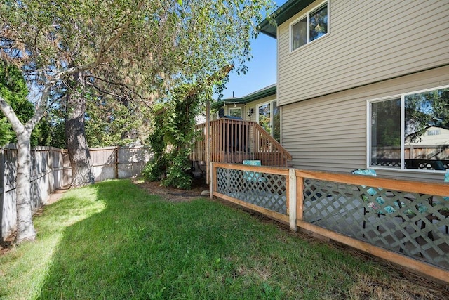 view of yard with a deck