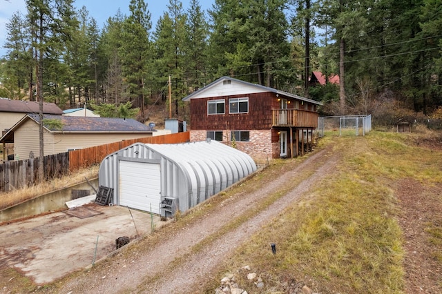 view of outbuilding featuring a garage