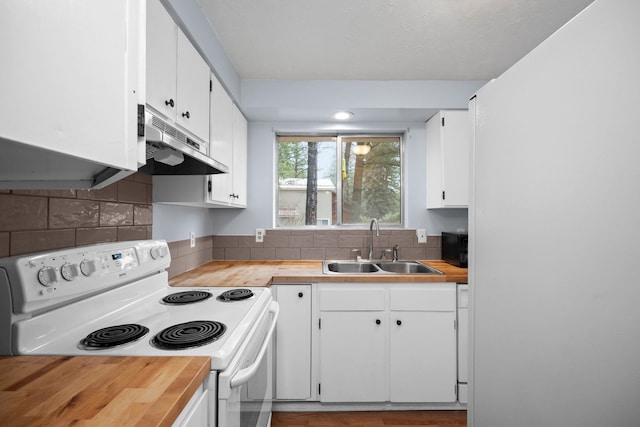 kitchen featuring backsplash, wooden counters, white cabinets, sink, and white electric stove