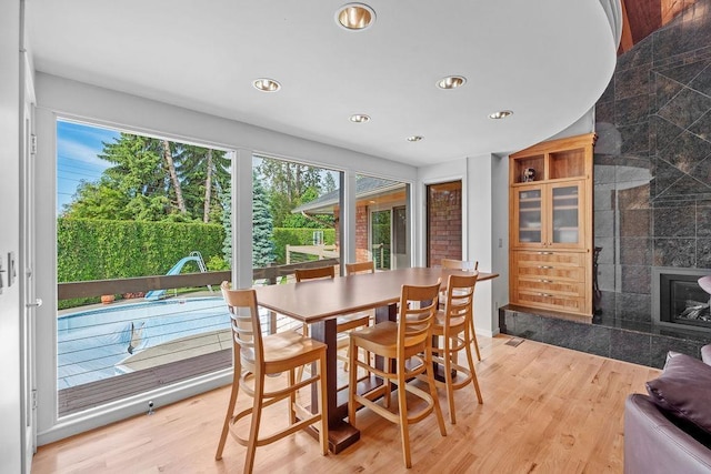 dining space featuring light hardwood / wood-style flooring